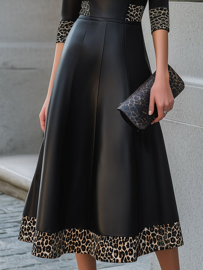 Nuria | Vestido Midi de Piel Sintética con Ribete Leopardo