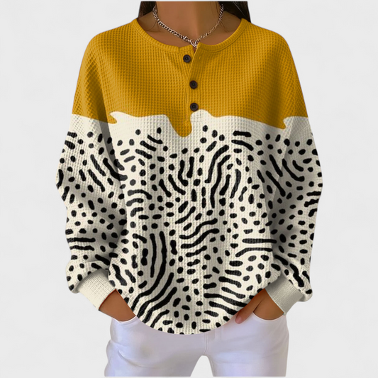 Lidia | Jersey amarillo y blanco con estampado animal